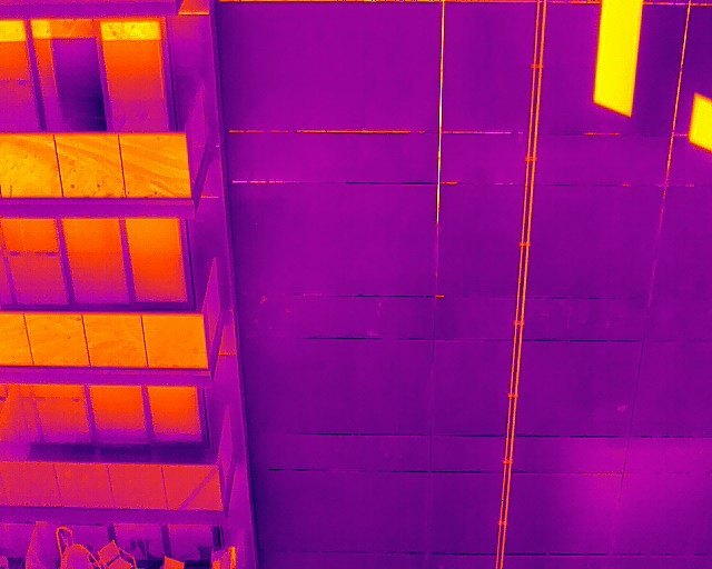 West wall cladding in thermal, a warm spot lower right