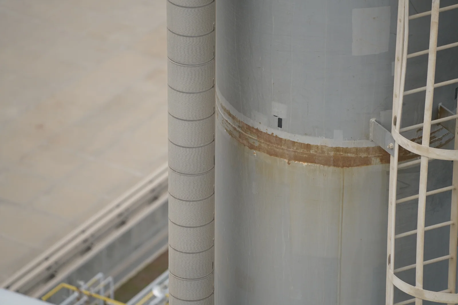 Moderate rust along a stack cladding seam